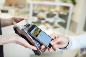 Using a digital wallet on cellular phone with Tap To Pay feature.